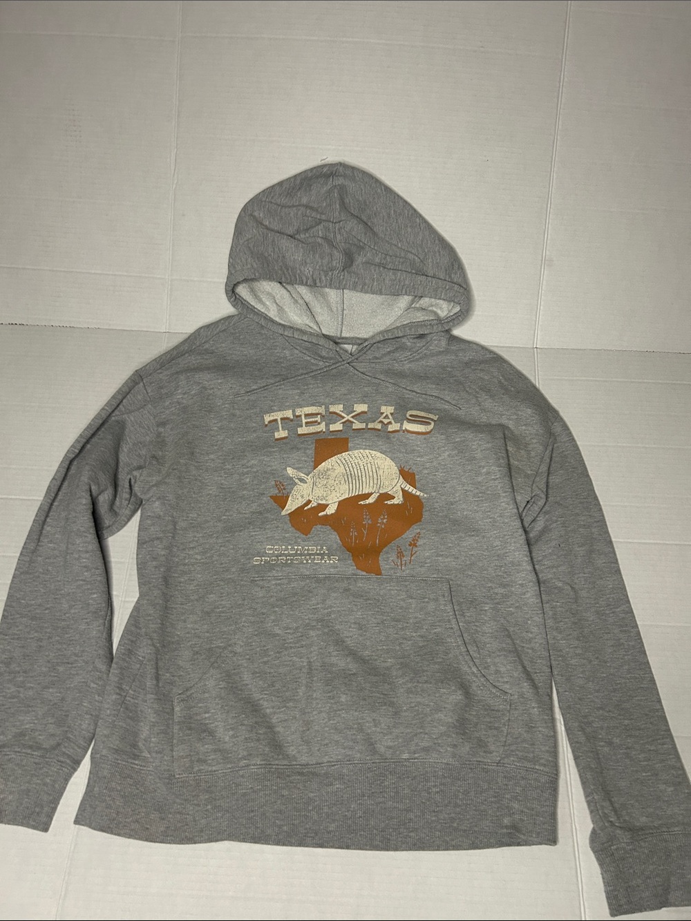 Columbia Sportswear Size  Small hoodie.
Distressed graphic of armadillo on Texas